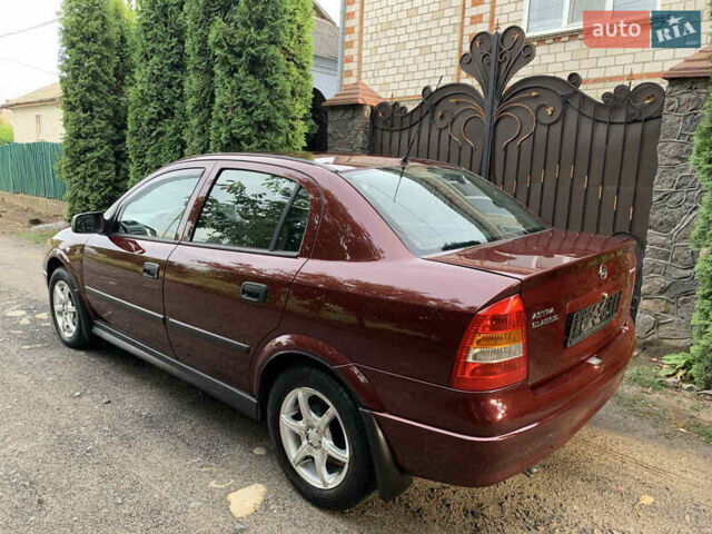 Красный Опель Астра, объемом двигателя 0 л и пробегом 88 тыс. км за 5000 $, фото 6 на Automoto.ua