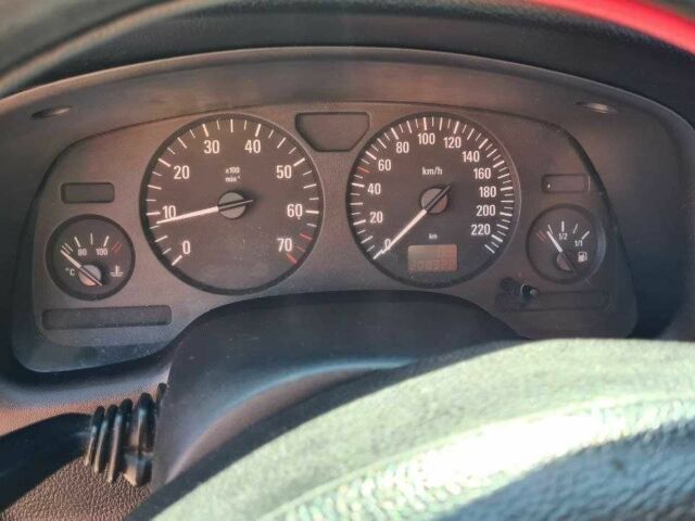 Красный Опель Астра, объемом двигателя 1.4 л и пробегом 3 тыс. км за 3400 $, фото 12 на Automoto.ua