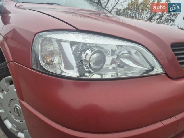 Красный Опель Астра, объемом двигателя 1.4 л и пробегом 233 тыс. км за 3800 $, фото 14 на Automoto.ua