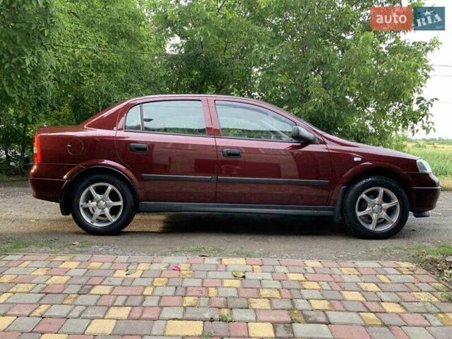 Красный Опель Астра, объемом двигателя 0 л и пробегом 88 тыс. км за 5000 $, фото 10 на Automoto.ua