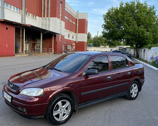 Красный Опель Астра, объемом двигателя 1.36 л и пробегом 173 тыс. км за 5500 $, фото 2 на Automoto.ua