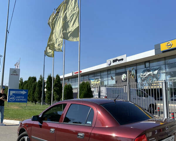 Красный Опель Астра, объемом двигателя 1.36 л и пробегом 173 тыс. км за 5500 $, фото 10 на Automoto.ua