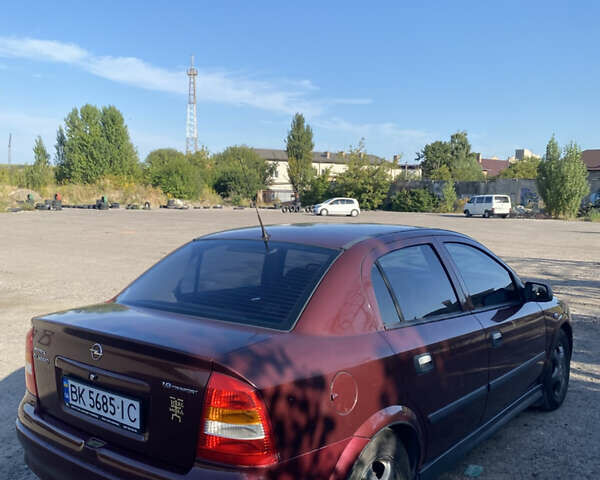 Красный Опель Астра, объемом двигателя 1.6 л и пробегом 233 тыс. км за 3300 $, фото 4 на Automoto.ua