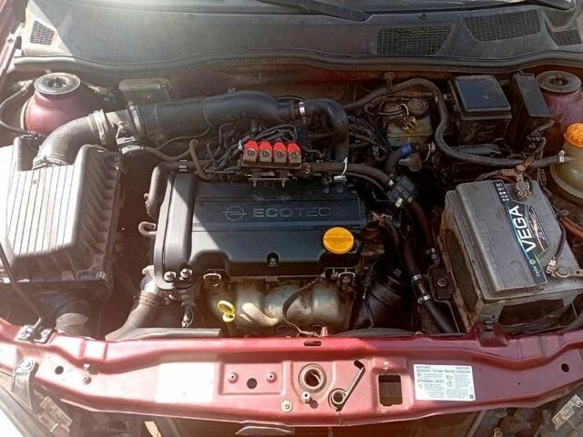 Червоний Опель Астра, об'ємом двигуна 1.4 л та пробігом 176 тис. км за 3700 $, фото 9 на Automoto.ua