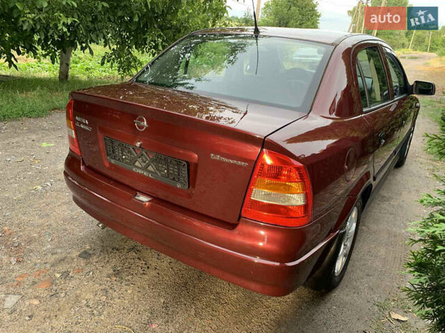 Красный Опель Астра, объемом двигателя 0 л и пробегом 88 тыс. км за 5000 $, фото 5 на Automoto.ua