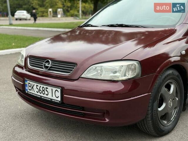 Червоний Опель Астра, об'ємом двигуна 1.6 л та пробігом 233 тис. км за 3400 $, фото 4 на Automoto.ua