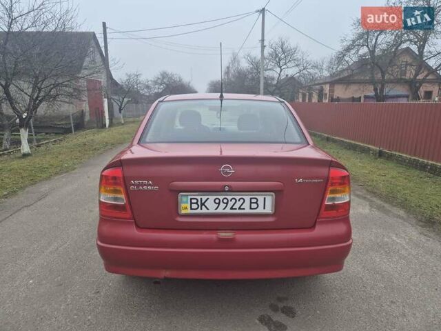 Красный Опель Астра, объемом двигателя 1.4 л и пробегом 233 тыс. км за 3800 $, фото 5 на Automoto.ua