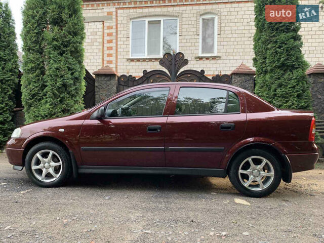 Красный Опель Астра, объемом двигателя 0 л и пробегом 88 тыс. км за 5000 $, фото 8 на Automoto.ua