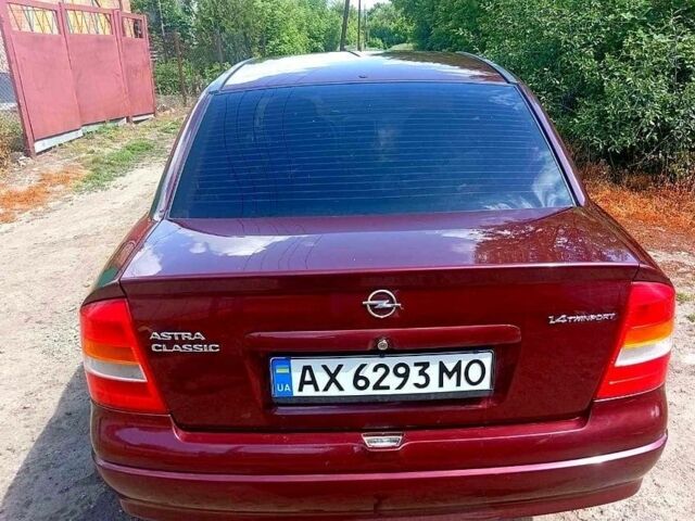 Червоний Опель Астра, об'ємом двигуна 1.4 л та пробігом 176 тис. км за 3700 $, фото 4 на Automoto.ua