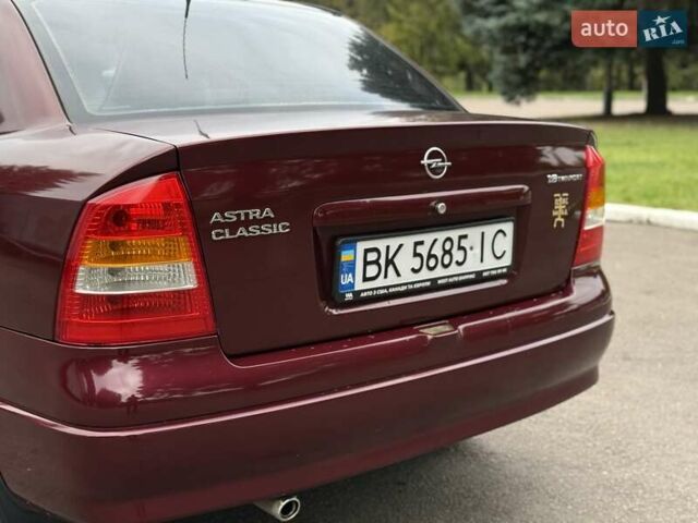 Червоний Опель Астра, об'ємом двигуна 1.6 л та пробігом 233 тис. км за 3400 $, фото 26 на Automoto.ua