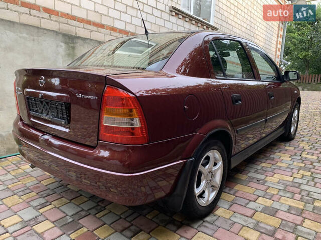 Красный Опель Астра, объемом двигателя 0 л и пробегом 88 тыс. км за 5000 $, фото 13 на Automoto.ua