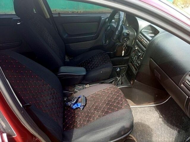 Червоний Опель Астра, об'ємом двигуна 1.4 л та пробігом 176 тис. км за 3700 $, фото 6 на Automoto.ua