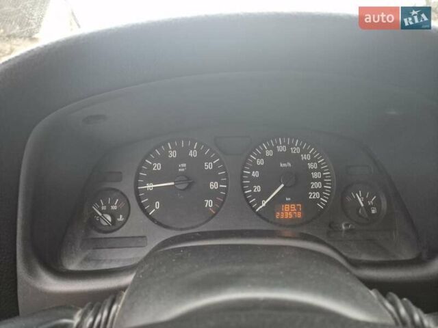 Красный Опель Астра, объемом двигателя 1.4 л и пробегом 233 тыс. км за 3800 $, фото 13 на Automoto.ua