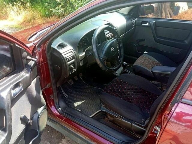 Червоний Опель Астра, об'ємом двигуна 1.4 л та пробігом 176 тис. км за 3700 $, фото 5 на Automoto.ua