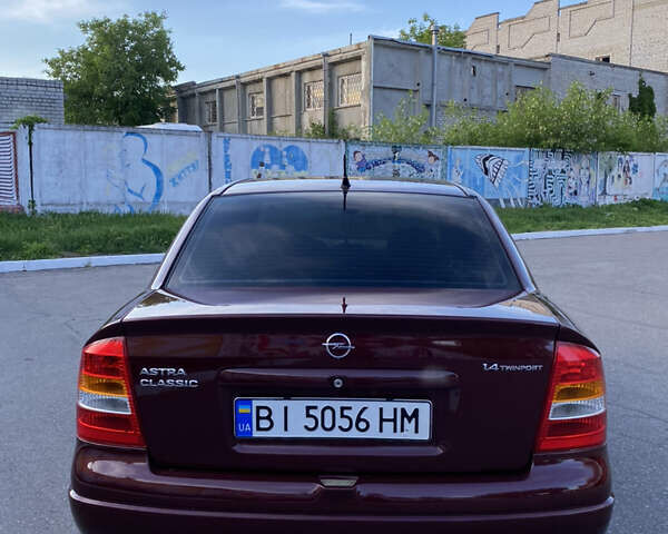Красный Опель Астра, объемом двигателя 1.36 л и пробегом 173 тыс. км за 4800 $, фото 4 на Automoto.ua