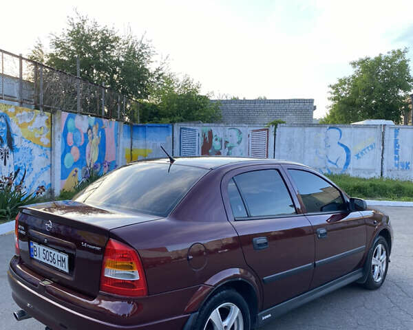 Красный Опель Астра, объемом двигателя 1.36 л и пробегом 173 тыс. км за 5500 $, фото 5 на Automoto.ua