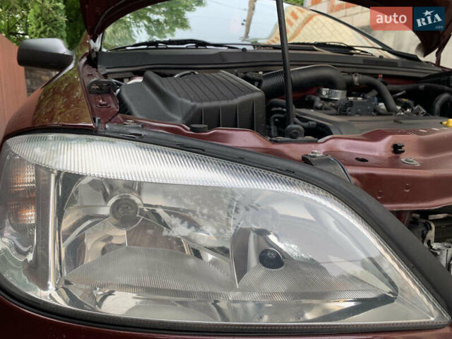 Красный Опель Астра, объемом двигателя 0 л и пробегом 88 тыс. км за 5000 $, фото 25 на Automoto.ua