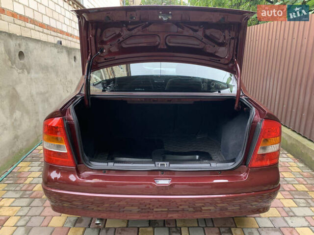 Красный Опель Астра, объемом двигателя 0 л и пробегом 88 тыс. км за 5000 $, фото 12 на Automoto.ua