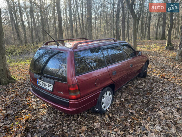 Красный Опель Астра, объемом двигателя 1.7 л и пробегом 413 тыс. км за 2450 $, фото 11 на Automoto.ua