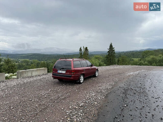 Красный Опель Астра, объемом двигателя 1.7 л и пробегом 413 тыс. км за 2450 $, фото 1 на Automoto.ua