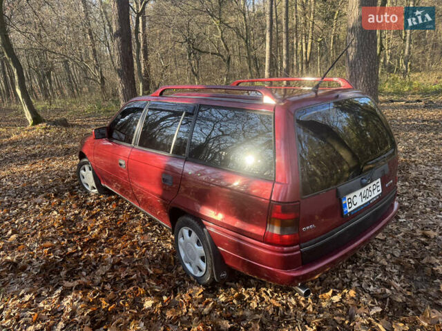 Красный Опель Астра, объемом двигателя 1.7 л и пробегом 413 тыс. км за 2450 $, фото 7 на Automoto.ua