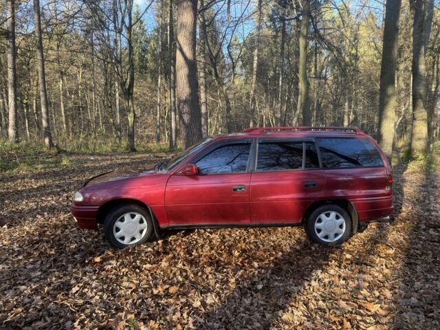 Красный Опель Астра, объемом двигателя 1.7 л и пробегом 413 тыс. км за 2450 $, фото 1 на Automoto.ua