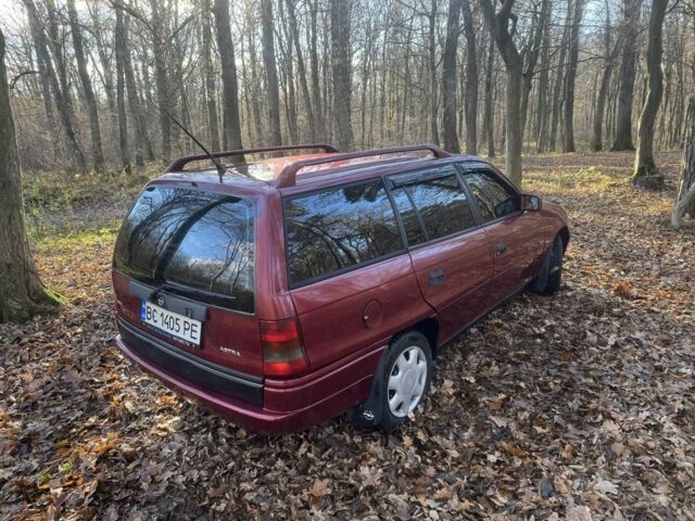 Красный Опель Астра, объемом двигателя 1.7 л и пробегом 413 тыс. км за 2450 $, фото 4 на Automoto.ua