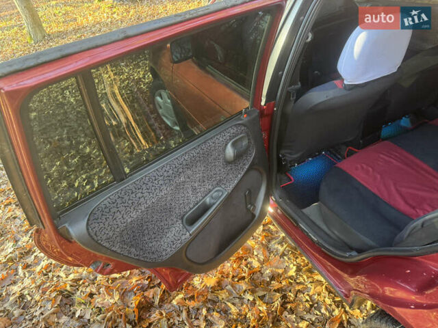 Красный Опель Астра, объемом двигателя 1.7 л и пробегом 413 тыс. км за 2450 $, фото 18 на Automoto.ua