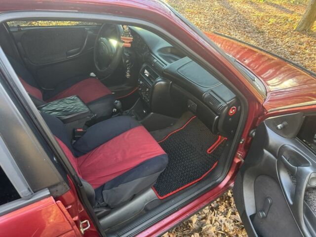 Красный Опель Астра, объемом двигателя 1.7 л и пробегом 413 тыс. км за 2450 $, фото 11 на Automoto.ua