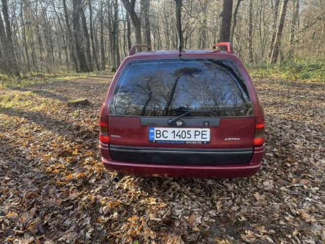 Красный Опель Астра, объемом двигателя 1.7 л и пробегом 413 тыс. км за 2450 $, фото 3 на Automoto.ua