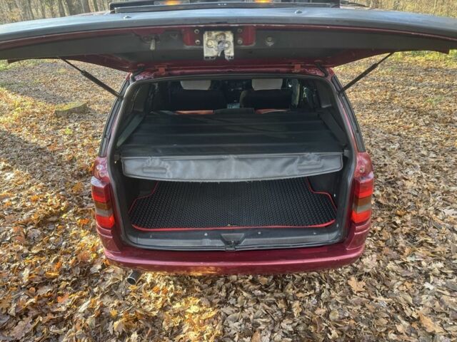 Красный Опель Астра, объемом двигателя 1.7 л и пробегом 413 тыс. км за 2450 $, фото 8 на Automoto.ua