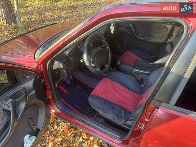 Красный Опель Астра, объемом двигателя 1.7 л и пробегом 413 тыс. км за 2450 $, фото 15 на Automoto.ua