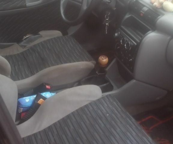 Красный Опель Астра, объемом двигателя 1.6 л и пробегом 400 тыс. км за 650 $, фото 2 на Automoto.ua