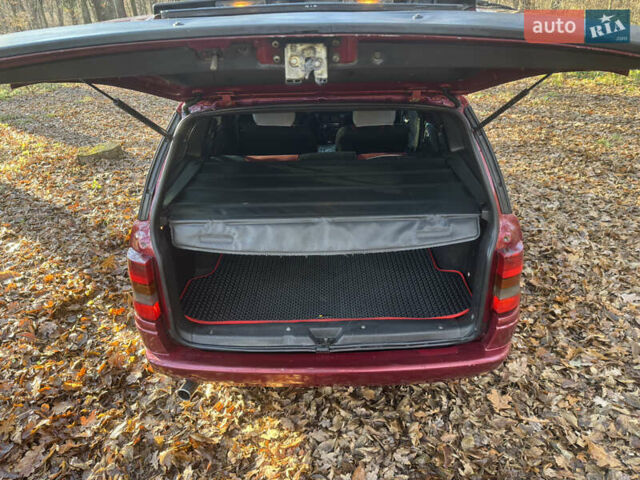 Красный Опель Астра, объемом двигателя 1.7 л и пробегом 413 тыс. км за 2450 $, фото 19 на Automoto.ua