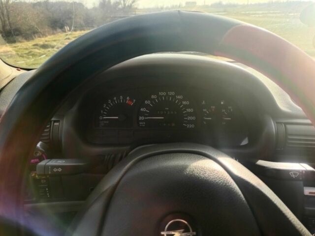 Червоний Опель Астра, об'ємом двигуна 1.4 л та пробігом 3 тис. км за 700 $, фото 7 на Automoto.ua