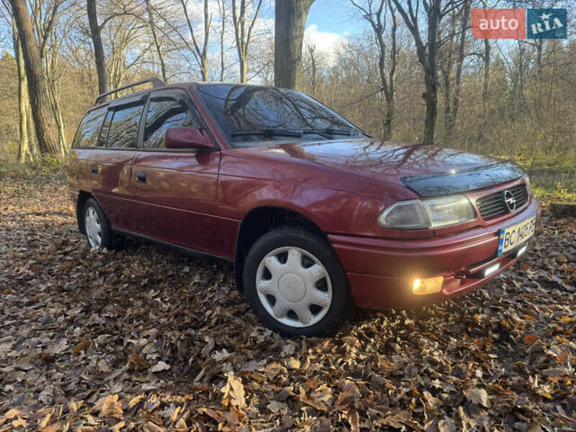 Красный Опель Астра, объемом двигателя 1.7 л и пробегом 413 тыс. км за 2450 $, фото 14 на Automoto.ua