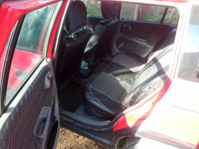 Красный Опель Астра, объемом двигателя 1.6 л и пробегом 300 тыс. км за 1000 $, фото 5 на Automoto.ua