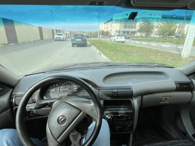 Червоний Опель Астра, об'ємом двигуна 1.6 л та пробігом 373 тис. км за 600 $, фото 1 на Automoto.ua