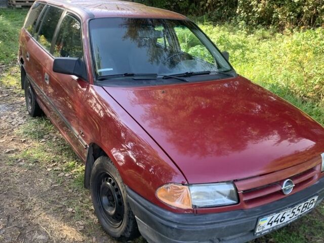 Красный Опель Астра, объемом двигателя 1.4 л и пробегом 200 тыс. км за 1160 $, фото 2 на Automoto.ua