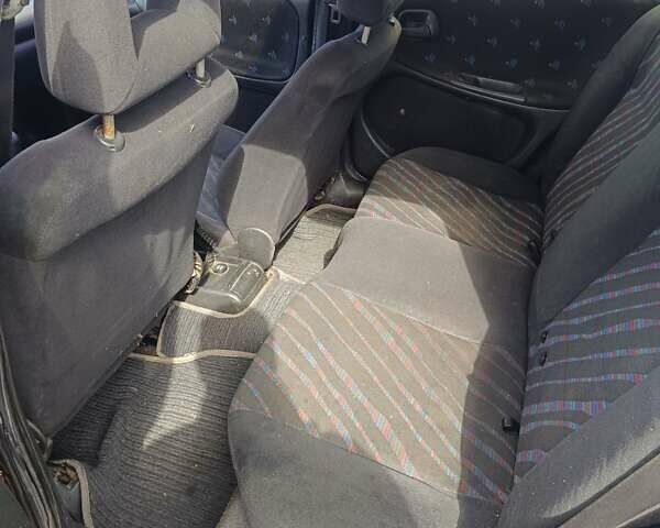 Червоний Опель Астра, об'ємом двигуна 1.6 л та пробігом 330 тис. км за 1300 $, фото 9 на Automoto.ua