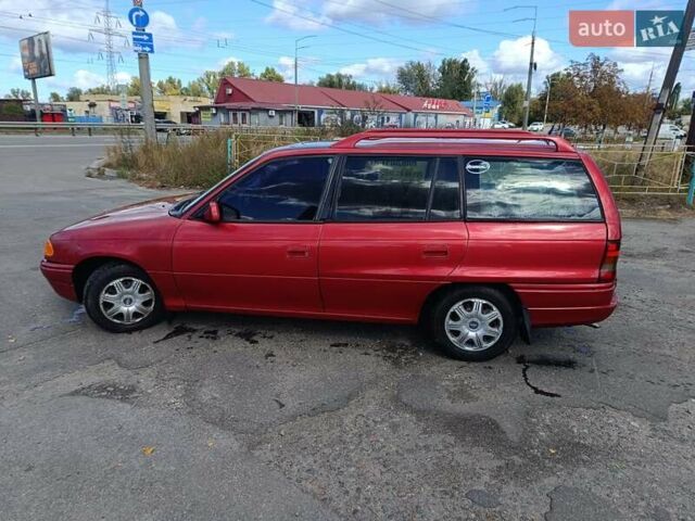 Червоний Опель Астра, об'ємом двигуна 1.6 л та пробігом 330 тис. км за 1300 $, фото 6 на Automoto.ua