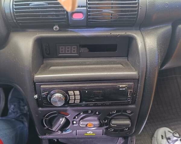 Червоний Опель Астра, об'ємом двигуна 1.6 л та пробігом 333 тис. км за 1400 $, фото 11 на Automoto.ua