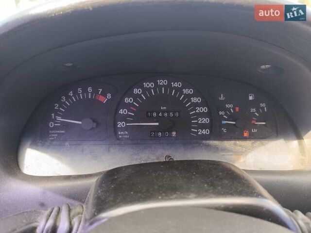 Червоний Опель Астра, об'ємом двигуна 1.6 л та пробігом 333 тис. км за 1400 $, фото 9 на Automoto.ua