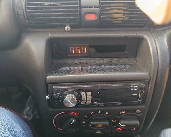 Червоний Опель Астра, об'ємом двигуна 1.6 л та пробігом 330 тис. км за 1300 $, фото 13 на Automoto.ua