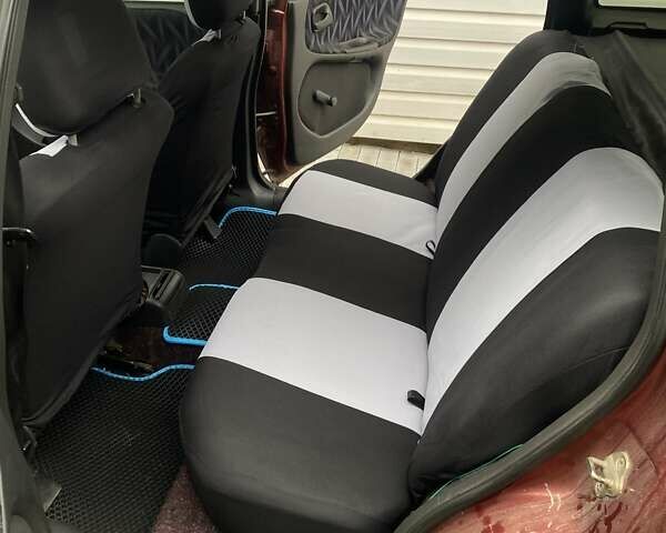 Красный Опель Астра, объемом двигателя 1.6 л и пробегом 387 тыс. км за 1700 $, фото 2 на Automoto.ua