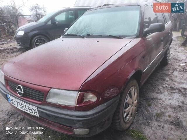 Красный Опель Астра, объемом двигателя 1.6 л и пробегом 320 тыс. км за 1200 $, фото 1 на Automoto.ua