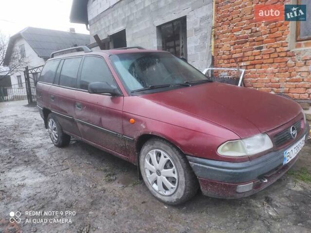 Красный Опель Астра, объемом двигателя 1.6 л и пробегом 320 тыс. км за 1200 $, фото 2 на Automoto.ua