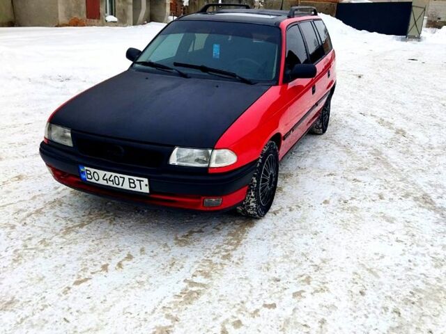 Красный Опель Астра, объемом двигателя 1.6 л и пробегом 330 тыс. км за 1550 $, фото 11 на Automoto.ua