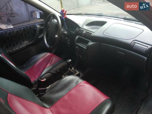 Червоний Опель Астра, об'ємом двигуна 1.6 л та пробігом 43 тис. км за 1300 $, фото 2 на Automoto.ua