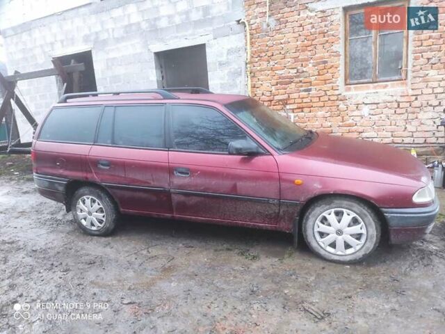 Красный Опель Астра, объемом двигателя 1.6 л и пробегом 320 тыс. км за 1200 $, фото 3 на Automoto.ua